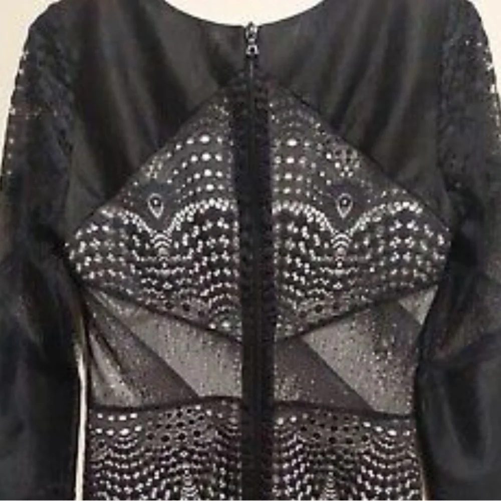 Sandro
Black White Lace Overlay Cocktail Dress
Size: US 4 (S) Length: Sh… - Picture 6 of 9